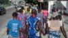 People march in the streets of Lagos as part of the National Day of Mourning, aiming at commemorating all the lives lost to violent killings and mass displacement in the country, on May 28, 2018.