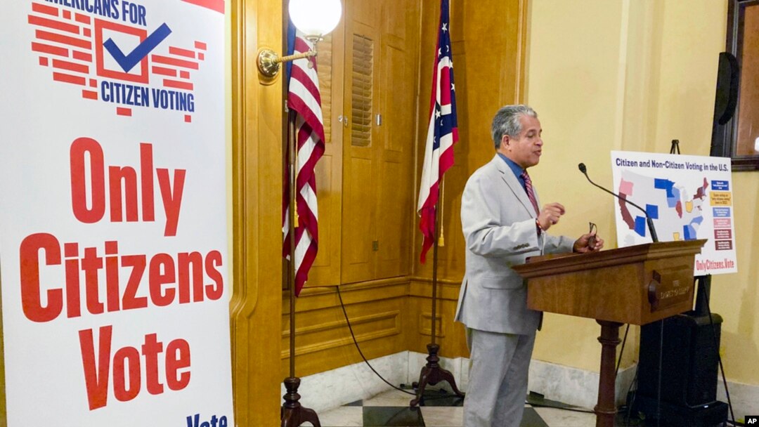 FILE - Luis Gil, a Republican candidate for Franklin County Commissioner in central Ohio, speaks in favor of a constitutional amendment on fall ballots that would prohibit noncitizen voting, at the Ohio Statehouse in Columbus, Ohio, on Oct. 6, 2022. 