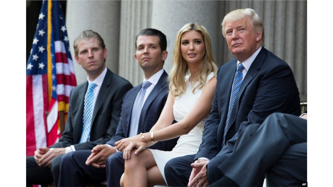 FILE - From left, Eric Trump, Donald Trump Jr. and Ivanka Trump — shown with their father at a groundbreaking ceremony for the Trump International Hotel in Washington, July 23, 2014.