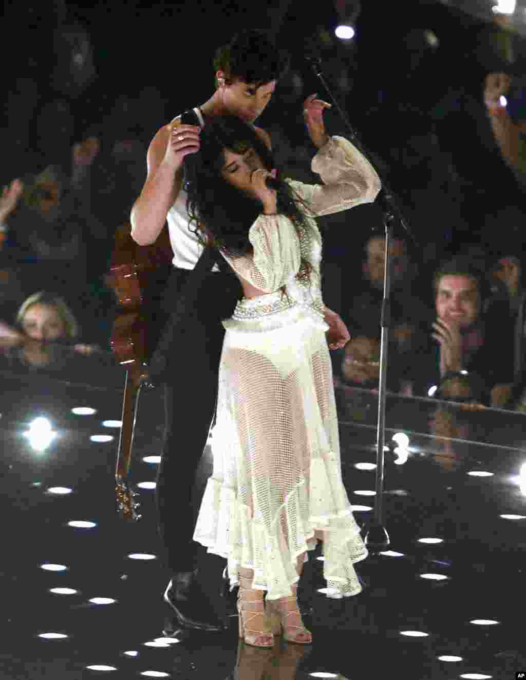 Camila Cabello, foreground, and Shawn Mendes perform "Senorita" at the MTV Video Music Awards at the Prudential Center in Newark, New Jersey, Aug. 26, 2019.