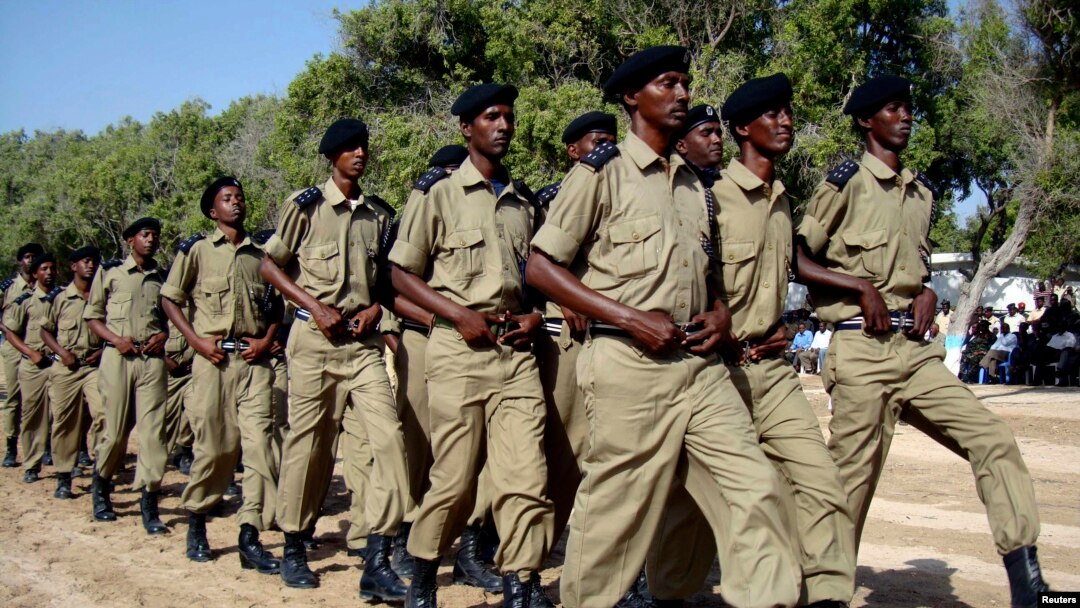  FILE - Somali police march during a ceremony in Mogadishu, Dec. 20, 2008. The ceremony marked 65 years since the academy was established in 1943. 
