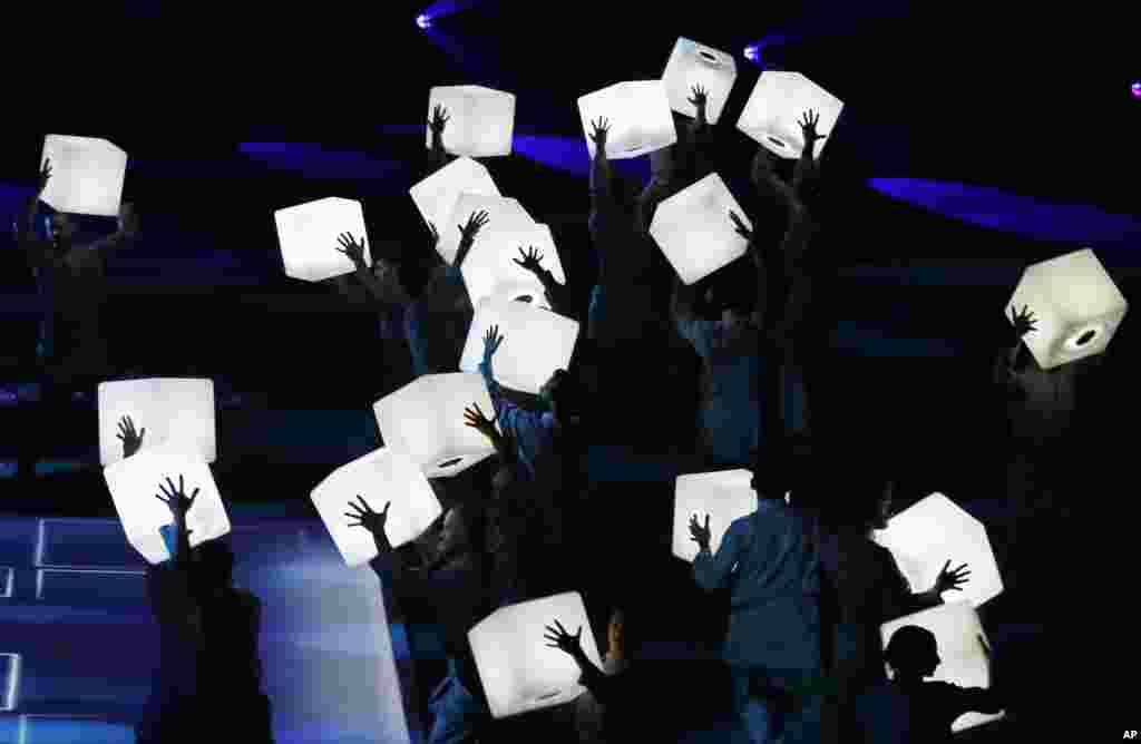 Dancers perform during a concert titled "Mettle to the Top" at the green hall theatee in Riyadh, Saudi Arabia, Sept. 21, 2019, marking Saudi 89th National Day celebrations.