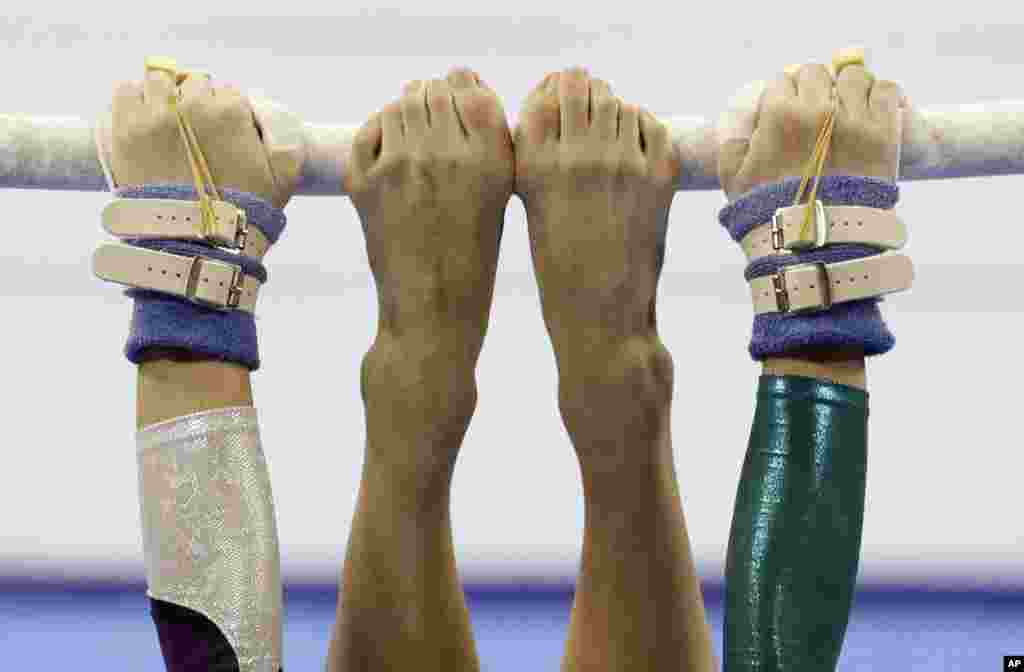 Vietnam's Ngoc Huong Do Thi performs at the uneven bars during the women's artistic gymnastics competition at the 30th South East Asian Games in Manila, Philippines.