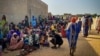 FILE - Sudanese refugees are seen gathered as Doctors Without Borders (MSF) teams assist the war-wounded from West Darfur, Sudan, in Adre, Chad, June 16, 2023. (Mohammad Ghannam/MSF/Handout via Reuters)