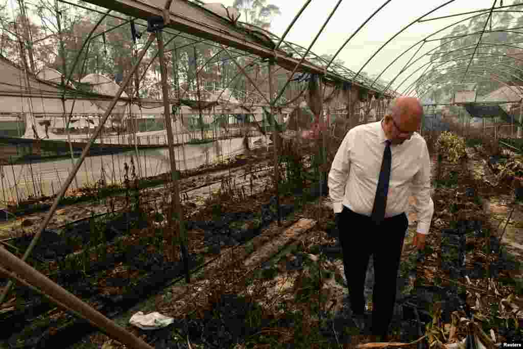 Australia's Prime Minister Scott Morrison tours the Wildflower farm owned by Paul and Melissa Churchman in Sarsfield, Victoria, Australia.