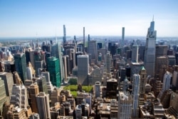 FILE - Uptown Manhattan is seen from the Empire State Building in New York City, May 18, 2021.