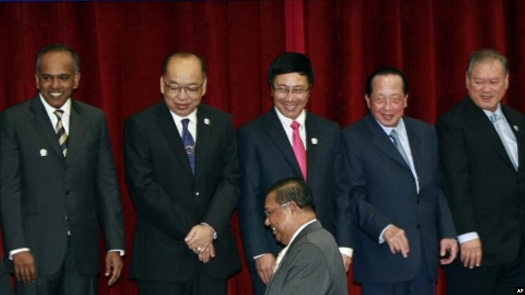 Association of Southeast Asian Nations, or ASEAN Foreign Ministers from left, K. Shanmugam of Singapore, Surapong Tovichakchaikul of Thailand, Pham Bihn Minh of Vietnam, Hor Namhong of Cambodia and Lim Jock Seng of Brunei wait for their counterpart from M