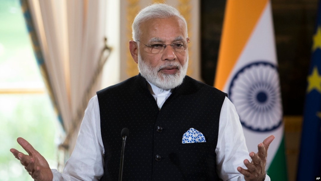 Indian Prime Minister Narendra Modi delivers a joint statement with French President Emmanuel Macron after their meeting at the Elysee Palace in Paris, France, June 3, 2017. 