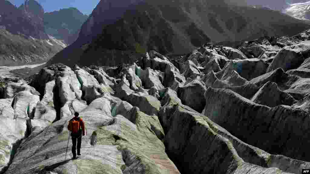 An alpinist ascends the Mer de Glace in Chamonix, France.