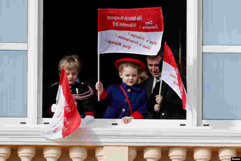Monaco's Prince Jacques and Princess Gabriella stand on the palace balcony during the celebrations marking Monaco's National Day.