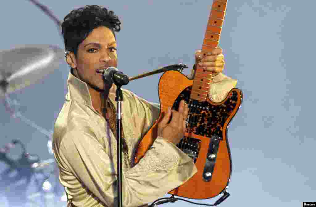 U.S. musician Prince performs for the first time in Britain since 2007 at the Hop Farm Festival near Paddock Wood, southern England, July 3, 2011.