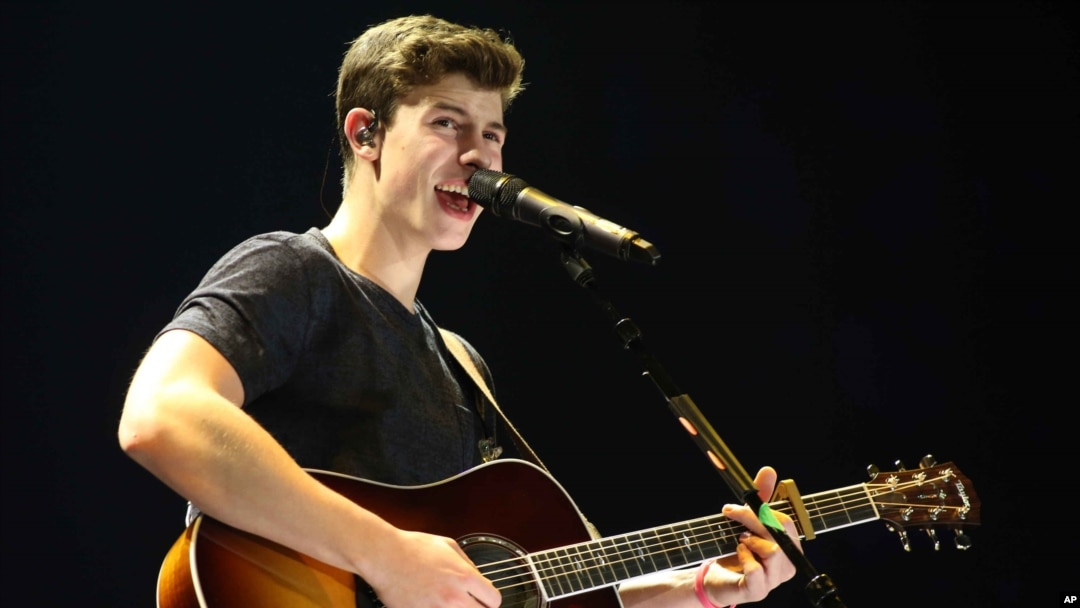 Shawn Mendes performs as the opener for Taylor Swift during The 1989 World Tour at the Georgia Dome on Oct. 24, 2015, in Atlanta. 