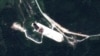 FILE - This satellite image provided by Astrium via 38 North shows new construction at the North Korean launch site of Sohae, near the northern border with China.