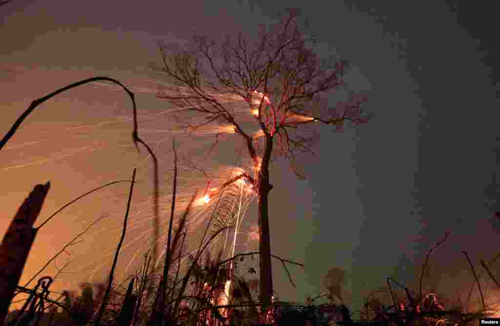 A tract of Amazon jungle burns as it is cleared by farmers in Rio Pardo, Rondonia, Brazil, Sept.15, 2019.