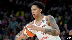 FILE - Phoenix Mercury center Brittney Griner grabs a rebound against the Seattle Storm during a WNBA game on Aug. 5, 2023, in Phoenix. Griner has re-signed with the Mercury, the only WNBA team she has played for. The deal was announced by the league on March 29, 2024.