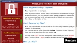 受到”想哭“(WannaCry)勒索軟件攻擊的電腦的屏幕顯示