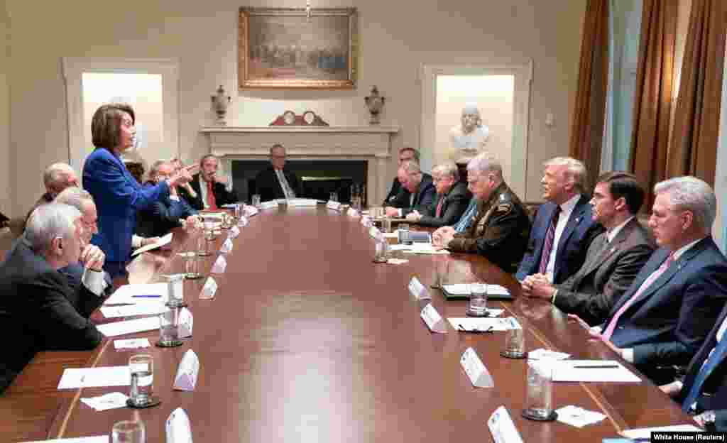 Speaker of the House Nancy Pelosi speaks to U.S. President Donald Trump during a meeting about Syria in the White House cabinet room in Washington, Oct. 16, 2019. Congressional Democratic Party lawmakers cut short the meeting after Trump had a “meltdown” over a House of Representatives vote condemning his Syria withdrawal. (White House official photo)