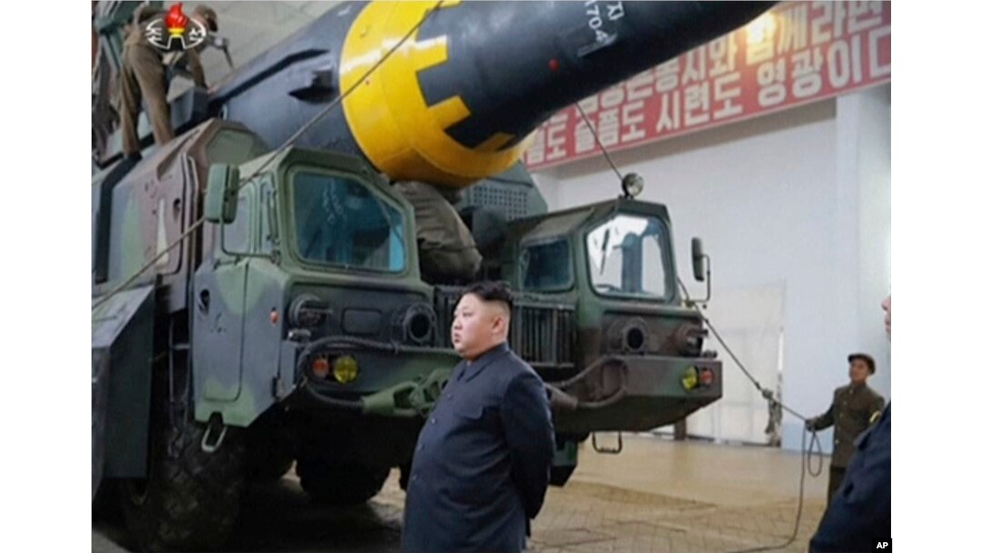 This image made from video of an undated still image broadcast in a news bulletin by North Korea's KRT, May 15, 2017, shows leader Kim Jong Un at what was said to be a missile test site at an undisclosed location in North Korea.