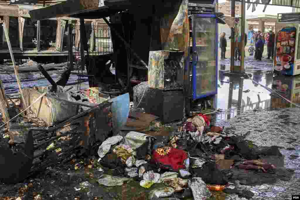 Passengers’ burned clothing and other belongings litter the platform after the crash, Feb. 27, 2019. (H. Elrasam/VOA)