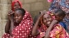 Relatives of missing school girls react in Dapchi in the northeastern state of Yobe, after an attack on the village by Boko Haram, Nigeria, Feb. 23, 2018. 