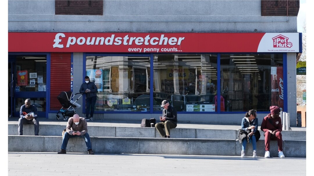 People practice social distancing in Woolwich as the spread of the coronavirus disease continues, in London, April 4, 2020.