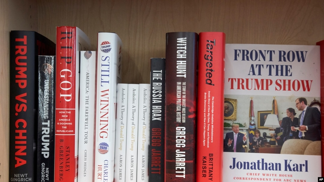 Books about Trump and the Trump administration dominate the nonfiction political science shelves at the Bookworm book store in Omaha, Neb., July 8, 2020.