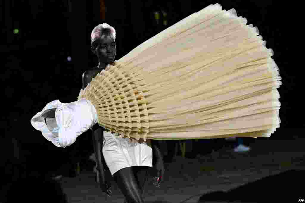 A model presents a creation for Viktor & Rolf during the Haute-Couture Spring-Summer 2023 Fashion Week in Paris, France.
