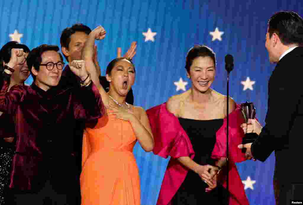 Michelle Yeoh, Ke Huy Quan, Stephanie Hsu and Jonathan Wang react as they accept the Best Picture award for "Everything Everywhere All at Once" during the 28th annual Critics Choice Awards in Los Angeles, California, Jan. 15, 2023. 