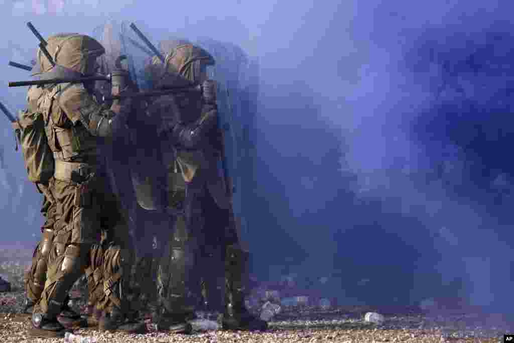 EUFOR (European Force) troops clash with protesters during an exercise "EUFOR Quick Response 2022" in Butmir base, in Sarajevo, Bosnia.