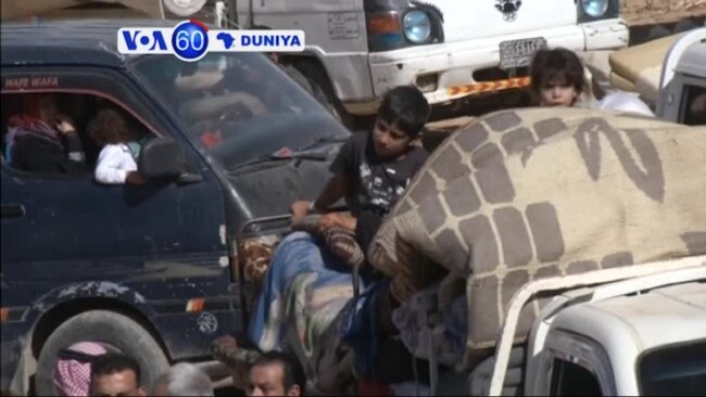 VOA60 Duniya: Daruruwan 'Yan Gudun Hijirar Syria a Lebanon Sun Fara Komawa Gida