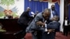 Deputies argue before a session to present the general policy of the appointed Prime Minister Fritz William Michel at the Parliament in Port-au-Prince, Haiti, Sept. 3, 2019. 