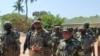 Kagame (no centro) e Nyusi (direita), em Cabo Delgado