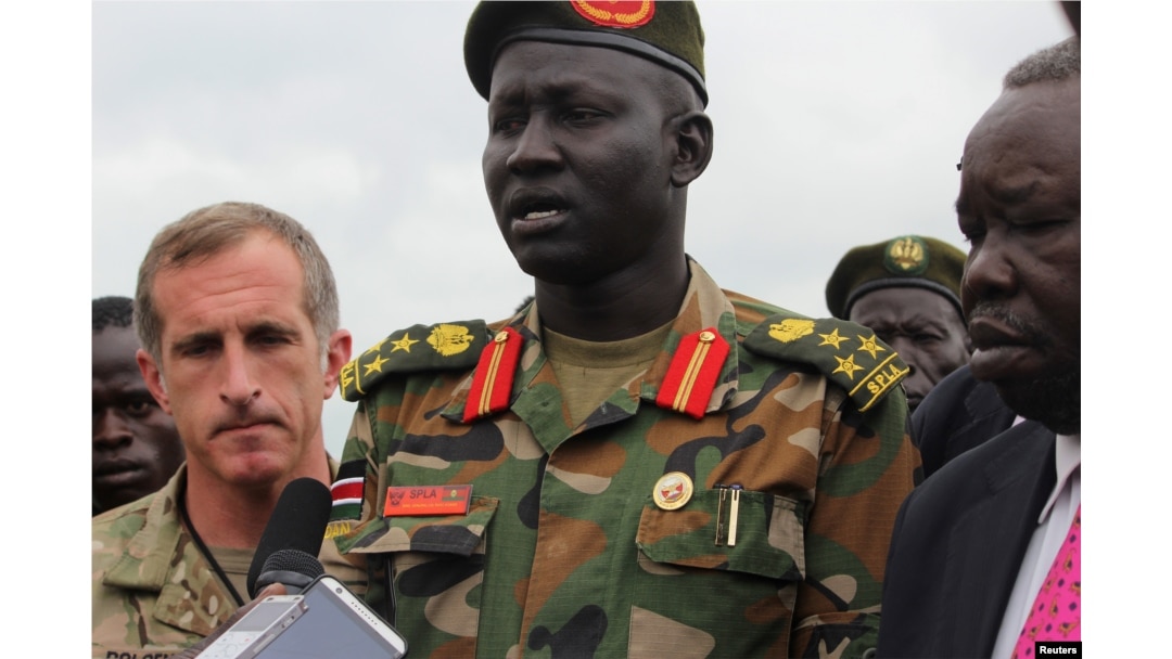 Brigadier General Lul Ruai Koang of the Sudan People's Liberation Army (SPLA) addresses the media on the killing of U.S. journalist Christopher Allen at the morgue of the military hospital in Juba, Aug. 29, 2017.