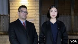 A Thai student, Bew Jirajariyawetch (R), and her attorney, Eric Parnes (L) speak out with VOA Thai following the attack at the Herald Square subway platform.