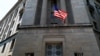 FILE - The U.S. Department of Justice headquarters building in Washington.