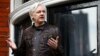 FILE - WikiLeaks founder Julian Assange is seen on the balcony of the Ecuadorian Embassy in London, Britain, May 19, 2017. 