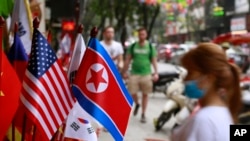 U.S and North Korean flags are on sale at a flag shop in Hanoi, Vietnam, Jan. 29, 2019. Vietnam's selection as the venue for the second summit between U.S. President Donald Trump and North Korean leader Kim Jong Un is largely a matter of convenience and security.