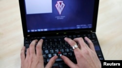 FILE - The possibility of hackers interfering with the U.S. election is "something that is a source of serious concern here in the administration," White House spokesman Josh Earnest said Thursday.