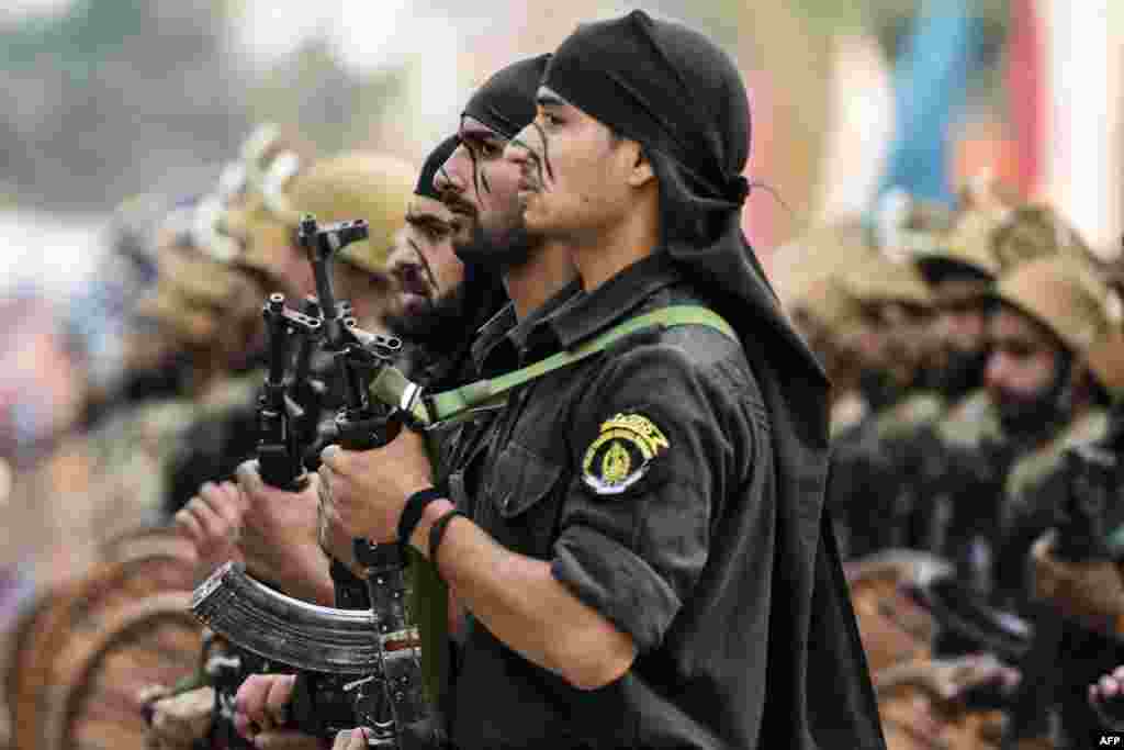 Newly recruited commandos take part in a parade at Manigam Ganderbal on the outskirts of Kashmir's capital Srinagar, India.