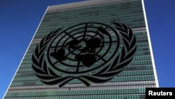 FILE - The United Nations logo is pictured in front of the United Nations Headquarters building during the U.N. General Assembly in the Manhattan borough of New York, Sept. 22, 2016.