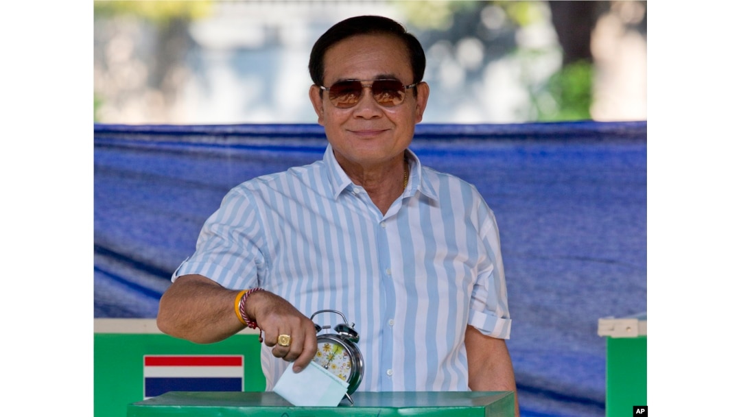 Thailand's Prime Minister Prayuth Chan-ocha casts his vote at a polling station in Bangkok, Thailand, March 24, 2019, during the nation's first general election since the military seized power in a 2014 coup.