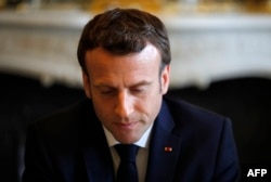 French President Emmanuel Macron meets French representatives of the Ibuka association for the memory of Rwanda's genocide, two days ahead of the 25th anniversary of the 1994 genocide, at the Elysee presidential Palace in Paris on April 5, 2019.