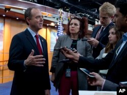 FILE - Rep. Adam Schiff, D-California, ranking member of the House Intelligence Committee, speaks with reporters after a news conference in Washington, July 17, 2018.
