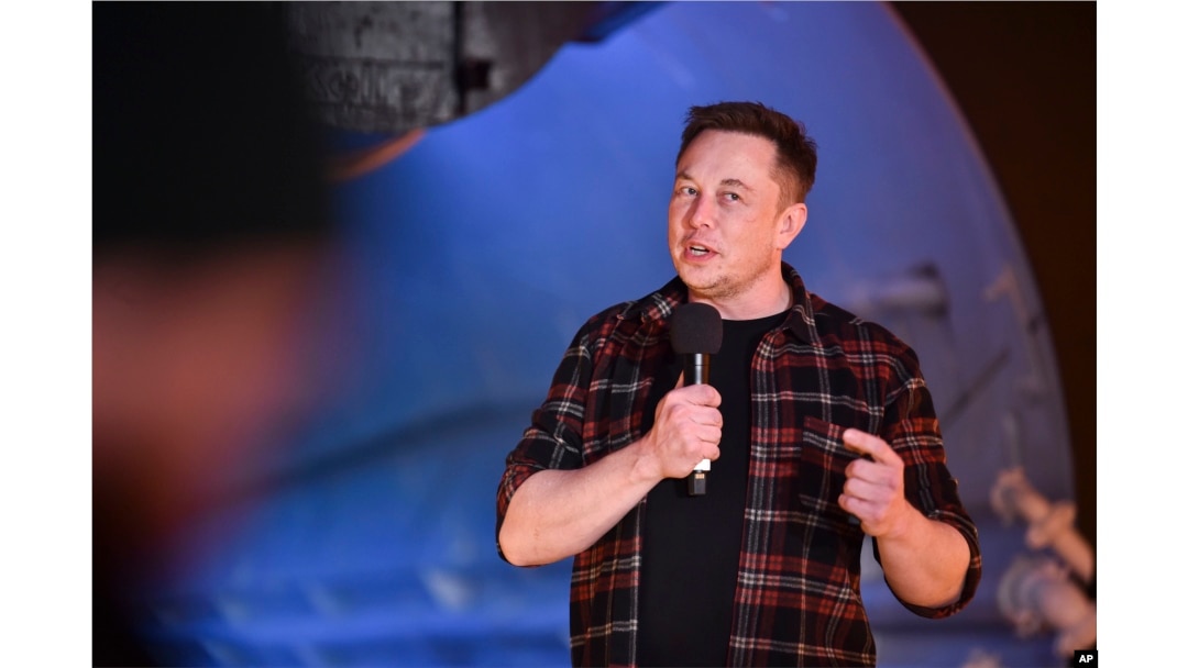 Elon Musk, co-founder and chief executive officer of Tesla Inc., speaks during an unveiling event for the Boring Co. Hawthorne test tunnel in Hawthorne, California., Dec. 18, 2018.