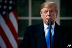 President Donald Trump speaks during an event in the Rose Garden at the White House to declare a national emergency in order to build a wall along the southern border, Feb. 15, 2019, in Washington.