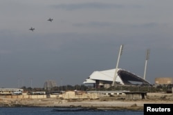 FILE - Russian warplanes fly over the Mediterranean coastal city of Latakia, Syria, Jan. 28, 2016.
