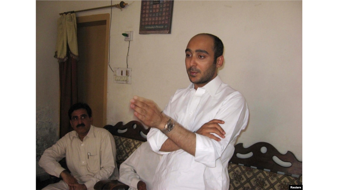 FILE - Ali Haider Gilani speaks during a campaign meeting at a house on the outskirts of Multan, May 9, 2013, before his abduction by unidentified gunmen.