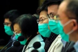 香港特首林鄭月娥戴著口罩出席記者會。（2020年1月28日）