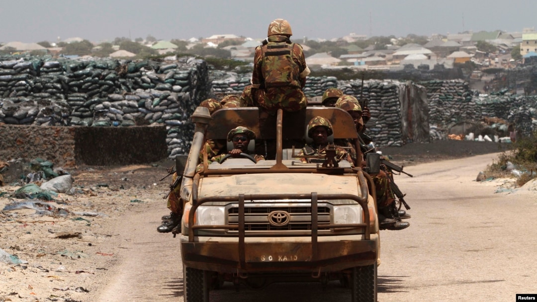 Kenya Defense Force soldiers, serving in African Union Mission in Somalia, on patrol, Kismayo, June 2013 file photo.
