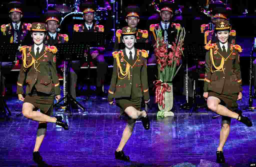 The Ensemble of Korean People's Army of North Korea performs on the Russia's Army Theatre's stage during the "Spasskaya Tower" international military music festival in Moscow, Russia.